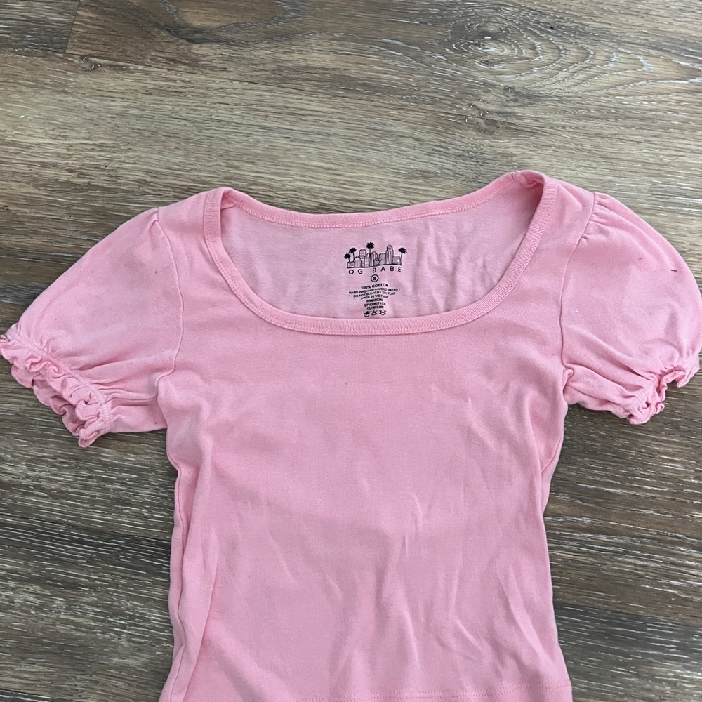 Pink blouse with puff sleeves